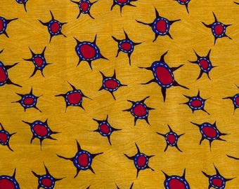 Abstract suns on marigold cotton half yard