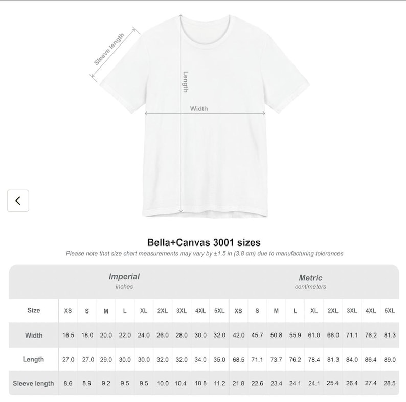 Puede incluir: Una camiseta blanca de manga corta acompa&ntilde;ada de una tabla de tallas para el modelo Bella+Canvas 3001. La tabla detalla el ancho, largo y largo de manga en pulgadas y cent&iacute;metros, indicando una tolerancia de fabricaci&oacute;n de 3,8 cm.