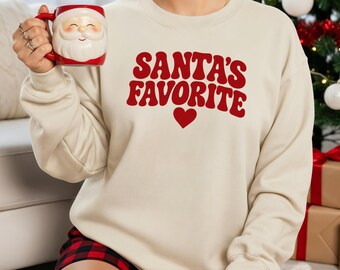 Weihnachtspullover „Santa’s Favorite“ - Sweatshirt Retro-Schriftzug, Winterpullover, Weihnachtspulli, Christmas Sweater, Weihnachten Pulli