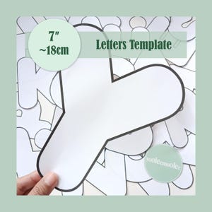 May include: A white letter template with a black outline is held in a hand. The template is approximately 7 inches (18 cm) in size. The words "Letters Template" are printed on the image. Other letter templates are in the background.