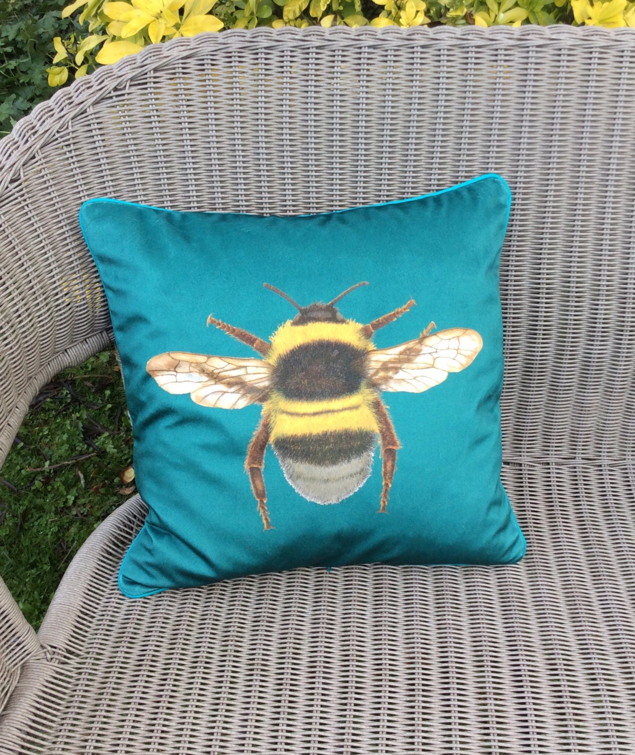 teal bee cushion