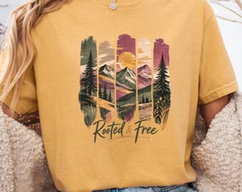 Camiseta gráfica Rooted & Free Mountain: Naturaleza, estilo bohemio para actividades al aire libre.