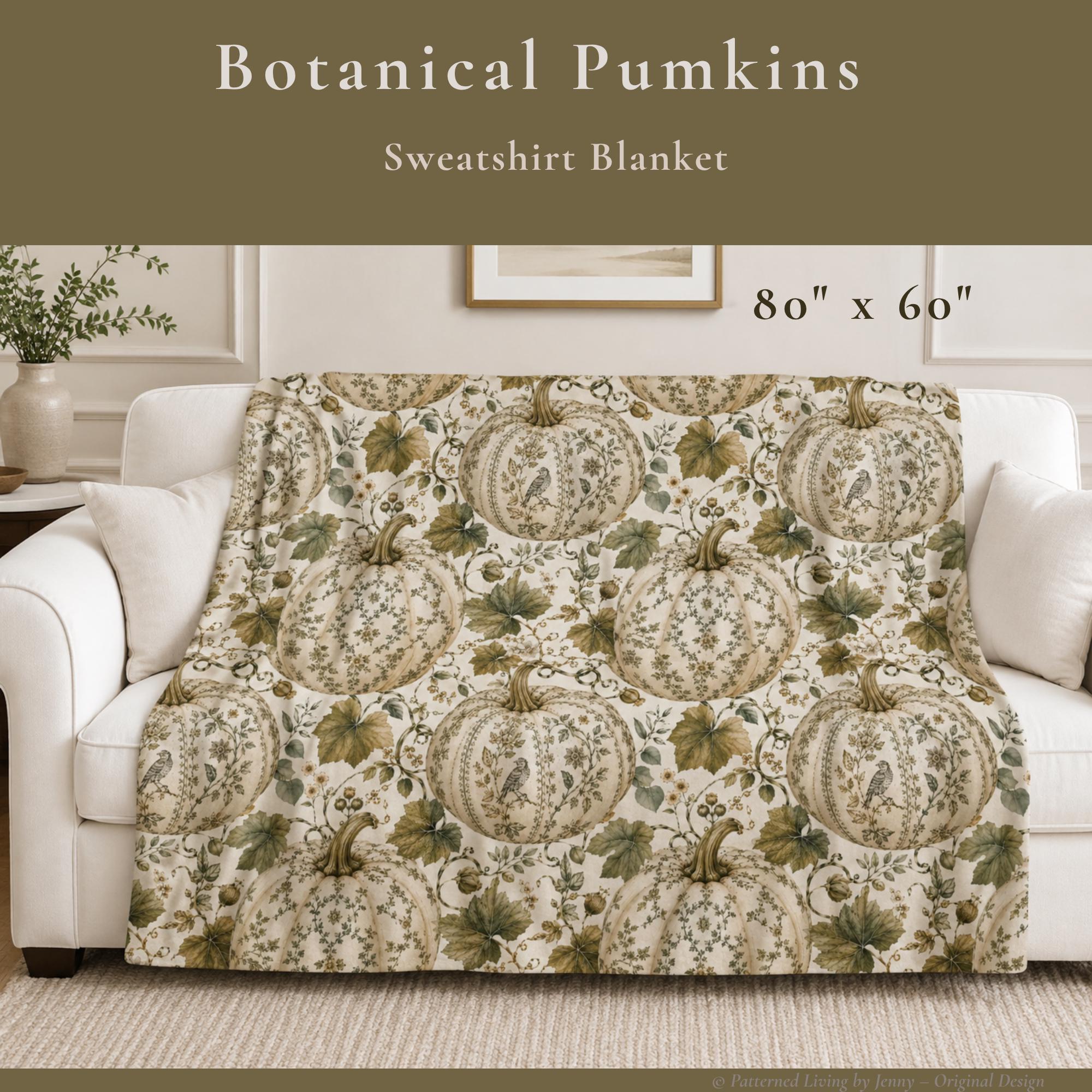 Vintage botanical pumpkin sweatshirt blanket styled on a sofa