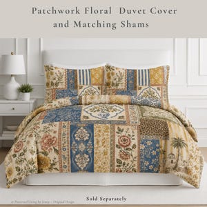 May include: A patchwork floral duvet cover and matching shams featuring a multi-patterned design with blue, gold, and cream tones. The fabric displays various floral motifs, stripes, leopard print, and a palm tree illustration on a bed.