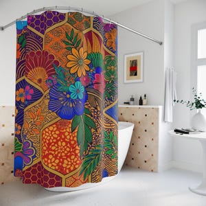 May include: A shower curtain featuring a vibrant, multi-coloured pattern of large, stylised flowers and leaves arranged within a geometric honeycomb grid. The design incorporates bold shades of orange, blue, purple, and green, with intricate line work and textures filling each hexagonal section across the fabric surface.