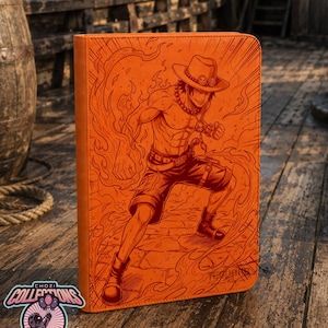 May include: An orange rectangular binder featuring a detailed engraved illustration of a shirtless character wearing a hat, shorts, and boots, surrounded by flames. The cover displays a dynamic action pose with lines radiating outward from the center.