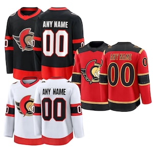 May include: A collection of hockey jerseys in black, red, and white. Each jersey features the team logo on the chest and the number "00" on the back. The jerseys also have the text "ANY NAME" on the back.