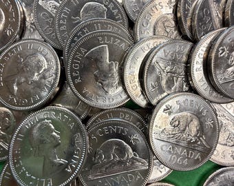 Monedas canadienses de 5 centavos de 1964 (juego de 2). Sin circular, sin revisar en busca de errores.