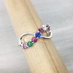 Sterling Silver Mothers Ring with an infinity shape and seven birthstones