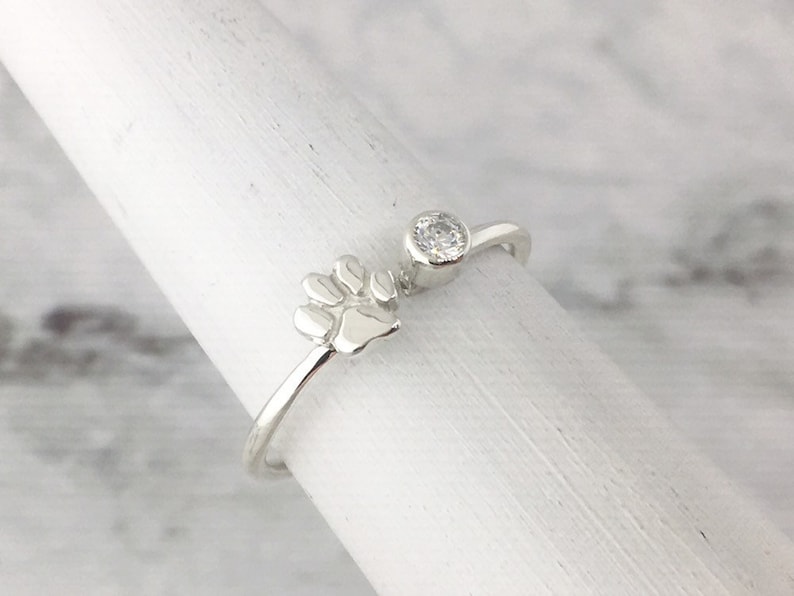 February Birthstone Ring with a Paw Print Detail, Sterling Silver Personalized Gift for Pet Lovers April