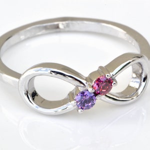 two stone ring in an infinity design, sterling silver