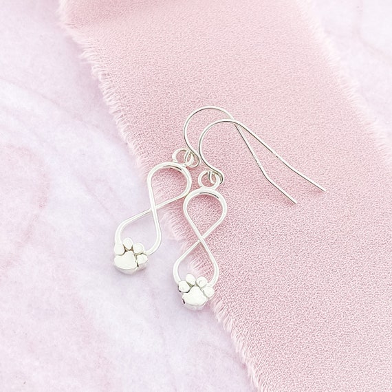 Paw print shop dangle earrings