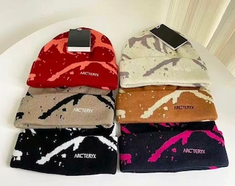 Berretto vintage in maglia Arc'teryx con logo dinosauro Arcteryx - Berretto da streetwear per esterni
