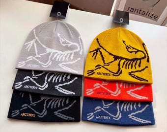 Cappello in maglia Arc'teryx – Berretto streetwear outdoor con grafica di dinosauri