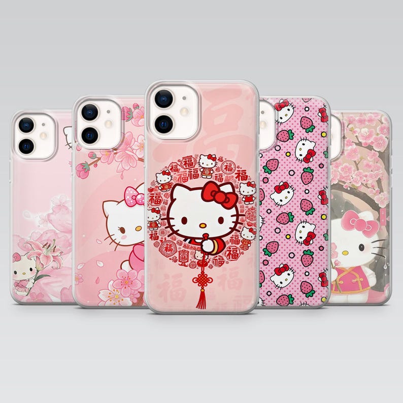 May include: A collection of pink phone cases featuring Hello Kitty designs. The cases showcase various themes, including floral patterns, strawberries, and the iconic character with a red bow. Each case has a clear border.