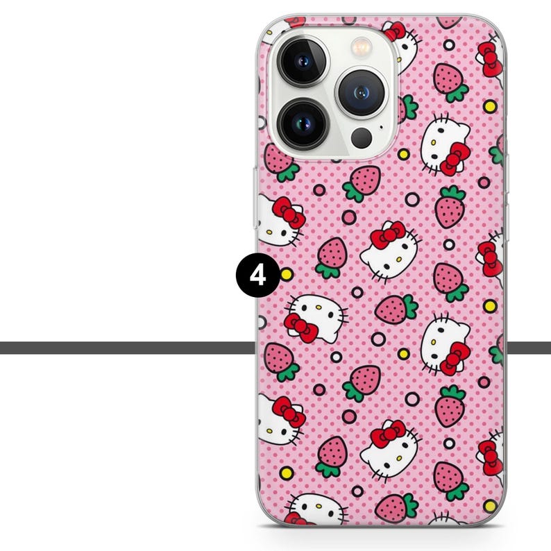 May include: A pink phone case featuring a repeating pattern of Hello Kitty faces, strawberries, and small pink polka dots. The case has a clear border and a camera cutout.