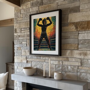 May include: Framed art print featuring a silhouette of a boxer in a boxing ring. The artwork has a vibrant color palette with a yellow and orange background. The boxer is wearing black boxing gloves and shorts.