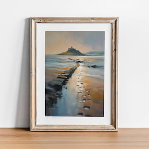 May include: Framed landscape art print depicting a coastal scene. A stone path leads to a small island with a castle. The artwork features a color palette of blues, browns, and yellows, with visible brushstrokes. The print is displayed in a wooden frame.