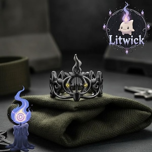 May include: A white ceramic mug with a black handle and the text "But First, Coffee" in a handwritten style. The mug is on a white surface. The mug is 4 inches tall.