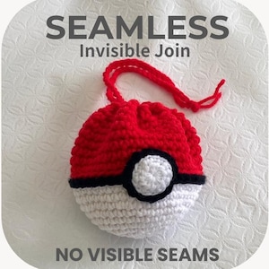 May include: A handmade crochet pouch in the shape of a red and white ball with a black stripe and a white circle. The pouch has a red drawstring closure. The text "SEAMLESS Invisible Join" and "NO VISIBLE SEAMS" are displayed.