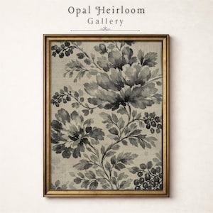 May include: A framed floral print with a gold-colored frame. The artwork features a large, detailed floral pattern in shades of gray and black against a beige background. The text "Opal Heirloom Gallery" is at the top.