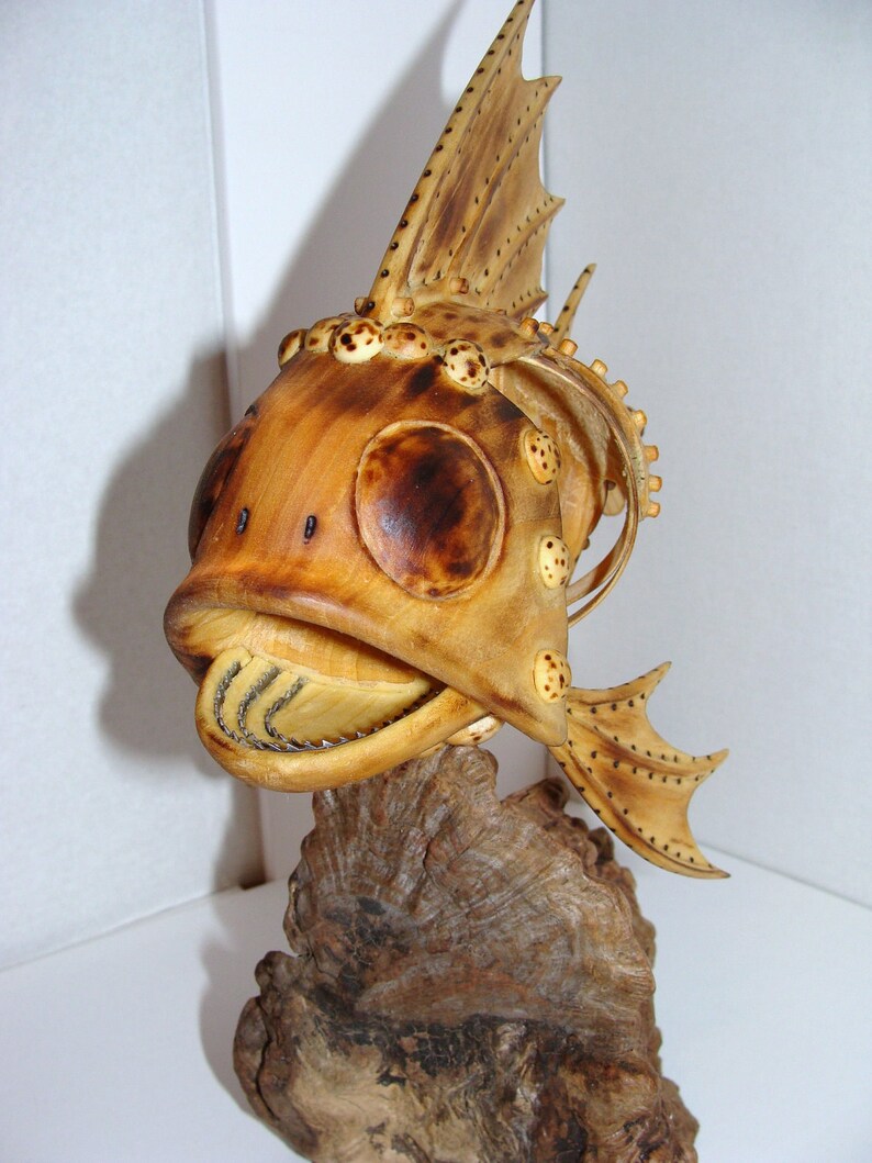 Hand carved Mechanical fish with propeller that turns by hand. Etsy