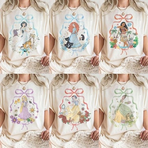 Camiseta Coquette Bows Disneyland con todos los personajes de princesas, colores cómodos, camiseta de Tiana, Ariel, Elsa, Rapunzel, Bella y Jazmín, camiseta de princesas de Disneyland imagen 1