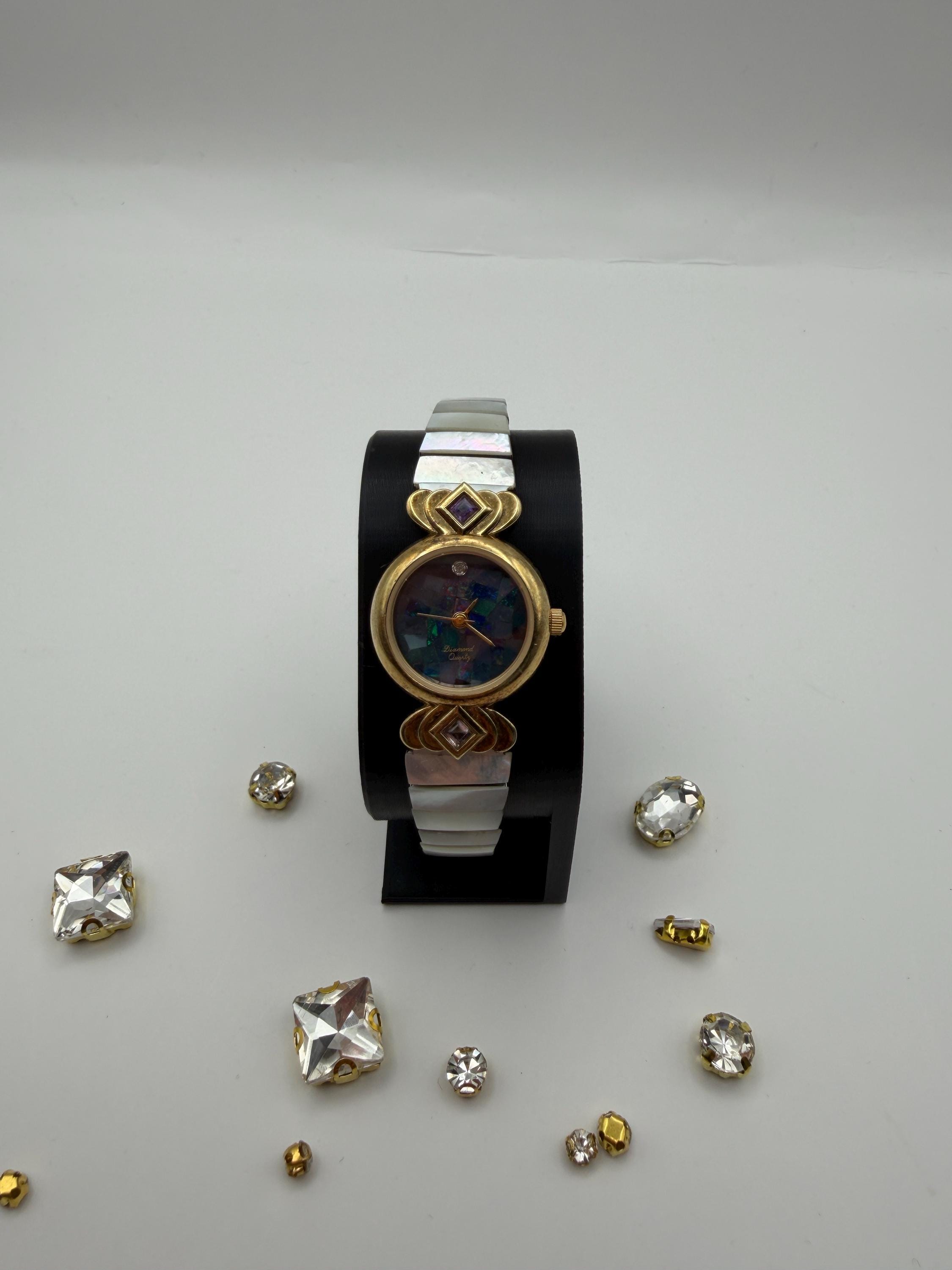 Jaclyn Smith Womens Quartz Watch Abalone Shell Dial Crystal Gold Tone Black Jaclyn Smith Gold Band Wristwatches for sale | eBay main image 3