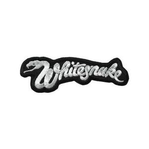 May include: An embroidered patch featuring the word Whitesnake in white cursive lettering on a black background. The letter W is stylized to resemble a snake head with an open mouth and fangs, creating a distinct graphic logo design.