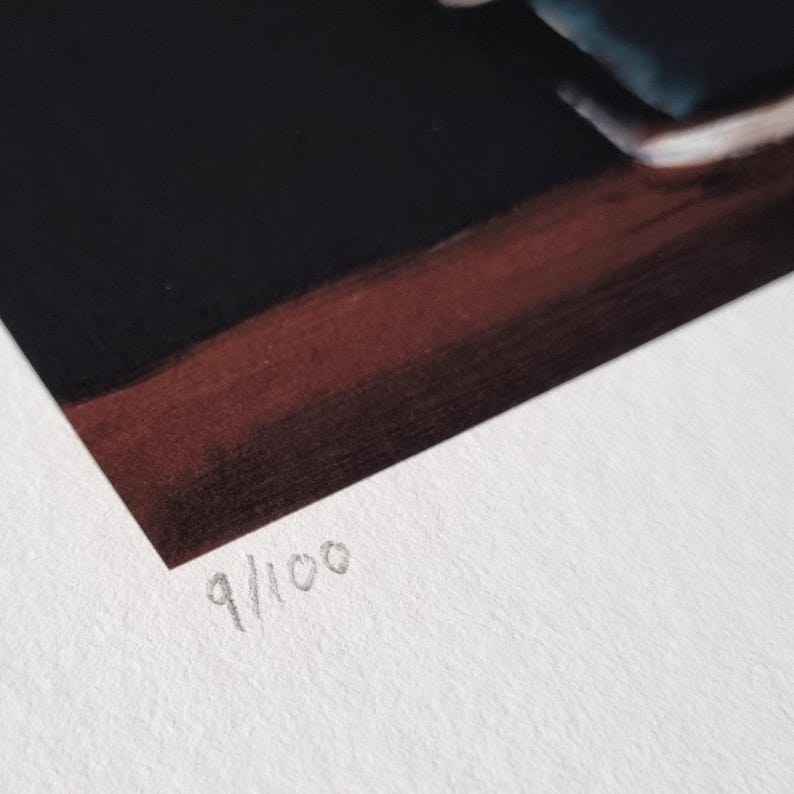 May include: A corner of a print with a dark background and a reddish-brown border. The bottom corner of the print shows the handwritten number "9/100" in gray pencil, indicating it is the ninth print out of a limited edition of 100.