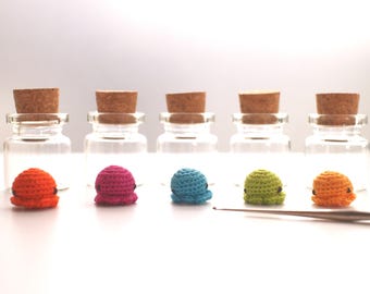 Miniature crochet octopus in a 2 cm glass jar - bright colours