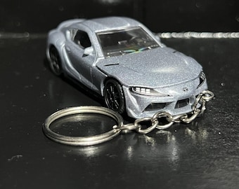 Llavero Toyota GR Supra, coche de metal fundido a escala 1:64, llavero LBX / Mini regalo