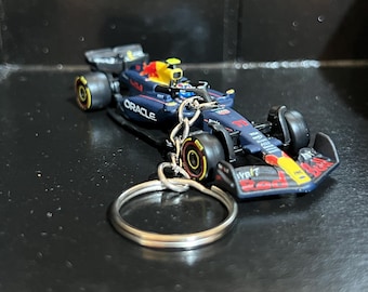 Llavero de F1 a escala 1:64, coche fundido a presión, Red Bull, nº 1, Fórmula 1, Max Verstappen, Sergio Pérez, Lando Norris, regalo en miniatura.