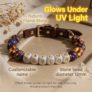 May include: A brown leather dog collar with gold-colored hardware and a series of glowing, natural flame stone beads. The collar features white lettered beads spelling "TAYLOR". The image text says "Glows Under UV Light".
