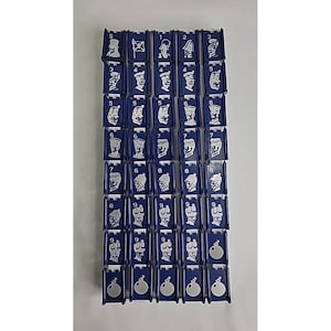 May include: A collection of blue game tiles with white illustrations of soldiers, flags, and bombs. Each tile has a number from 1 to 9, and the tiles are arranged in a grid pattern.