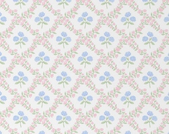 May include: A repeating pattern of blue hydrangea flowers and pink floral vines on a white backdrop. The design is arranged in a diamond grid, creating a delicate and feminine aesthetic. Suitable for wallpaper or fabric.