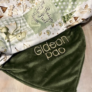 Dragon Baby Blanket: Fantasy Themed Nursery, Soft Minky Crib Comforter
Dragon minky baby blanket, shown with forest green minky. You can pick the back minky color. 
Dragon Baby Blanket Handmade Baby Quilt Fantasy Baby Nursery Bedding Baby Shower Gift Newborn Boy Room Decor Fairy Tale Crib Comforter