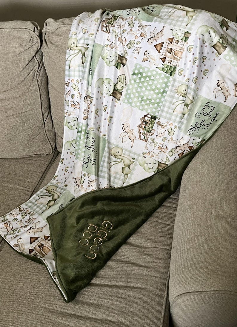 Dragon Baby Blanket: Fantasy Themed Nursery, Soft Minky Crib Comforter
Dragon minky baby blanket, shown with forest green minky. Blanket size 35x52 inches. You can pick the back minky color. 
Dragon Baby Blanket Handmade Baby Quilt Fantasy Baby Nursery Bedding Baby Shower Gift Newborn Boy Room Decor Fairy Tale Crib Comforter