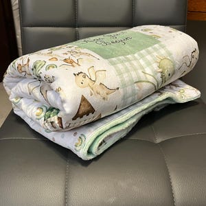 Dragon Baby Blanket: Fantasy Themed Nursery, Soft Minky Crib Comforter
Dragon minky baby blanket, shown as in the comforter option with sage green minky. Blanket size 35x52 inches. Blanket is handmade in Kansas, USA. You can pick the back minky color. 
Dragon Baby Blanket Handmade Baby Quilt Fantasy Baby Nursery Bedding Baby Shower Gift Newborn Boy Room Decor Fairy Tale Crib Comforter