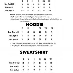 May include: A black and white size chart for t-shirts, hoodies, and sweatshirts. It lists measurements in inches for sizes S through 3XL, including chest width, body length, and sleeve length, with explanatory notes on how each measurement is taken.