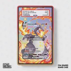 May include: A PSA graded guard case featuring a Charizard VMAX card design. The case has a red and tan frame, with the text "CARD NOT INCLUDE" visible. The card features a fiery background and the text "PSA GRADED GUARD CASE".