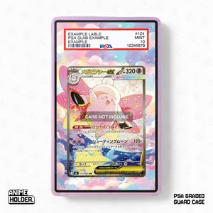 May include: A pink PSA graded guard case with a Pokémon card inside. The card features a pink and yellow illustration of a Mega Blissey EX card. The case has the text "EXAMPLE LABLE" and "PSA SLAB EXAMPLE". The text "CARD NOT INCLUDE" is also visible.