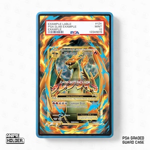 May include: A blue PSA graded guard case holding a Pokemon trading card. The card features a Charizard EX illustration with orange and blue flames. The case has a label with example information and the text "CARD NOT INCLUDE".
