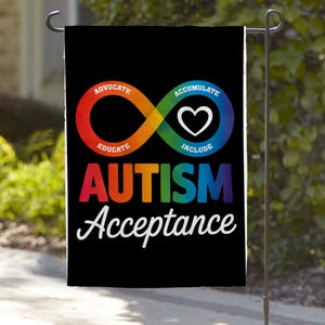 May include: Black garden flag with the words "AUTISM Acceptance" in rainbow colors. The flag features an infinity symbol with a heart in the center, and the words "ADVOCATE", "EDUCATE", "ACCUMULATE", and "INCLUDE".