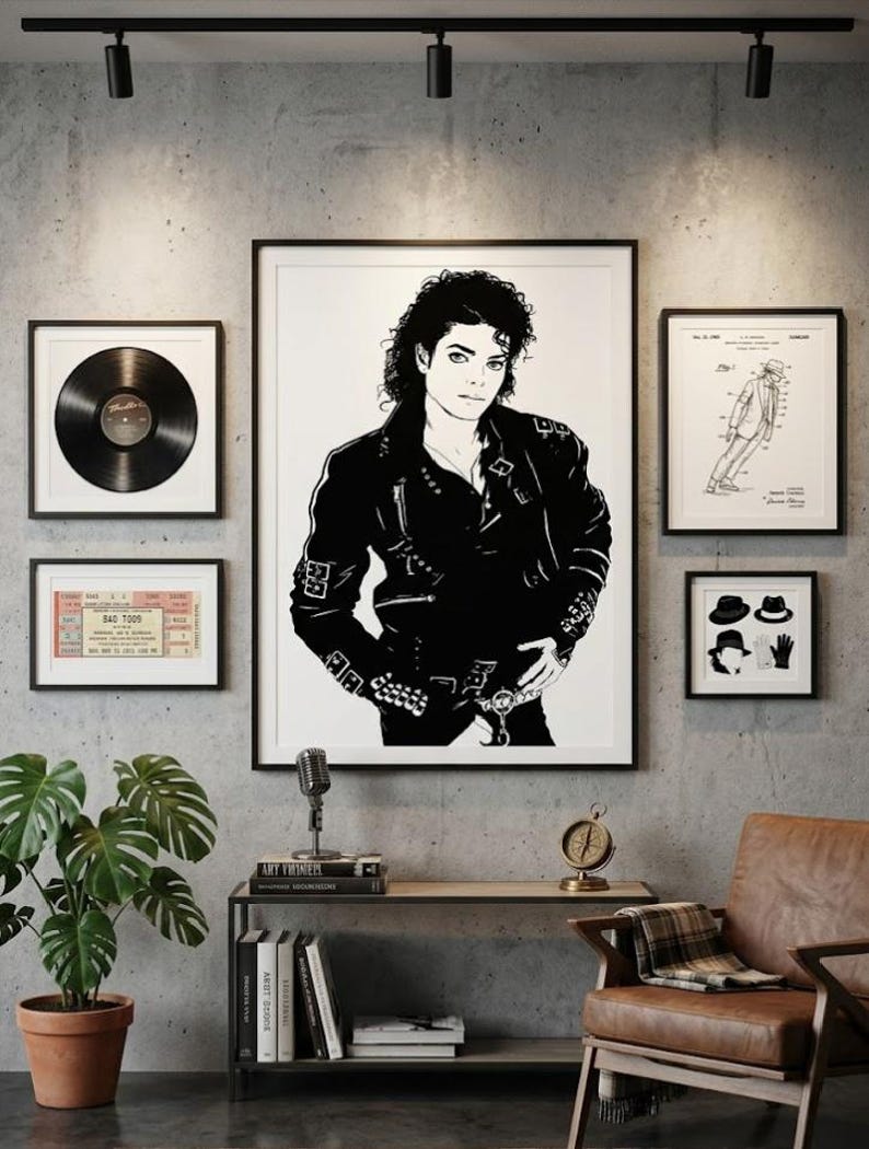 May include: A gallery wall featuring a large central black and white portrait of Michael Jackson in a leather jacket, flanked by a vinyl record, a concert ticket, a patent drawing of a dance move, and a print of a hat and glove icon set.