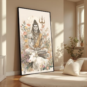 Puede incluir: Una impresión en acuarela enmarcada representa una figura sentada con cabello largo, adornada con joyas y una tela amarilla, sosteniendo un tridente. La figura está sentada sobre una vaca blanca, rodeada de flores. La obra de arte tiene un marco negro y se exhibe en interiores.