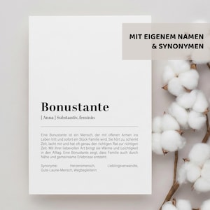 May include: A white card with the word "Bonustante" in bold black letters. The card also includes German text and a section titled "MIT EIGENEM NAMEN & SYNONYMEN". Fluffy white cotton flowers are in the background.