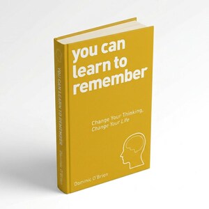 May include: A yellow book titled "you can learn to remember" with white text. The book's cover includes the text "Change Your Thinking, Change Your Life" and a brain outline. The author's name, Dominic O'Brien, is also visible.
