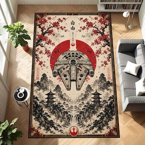 Peut inclure: Un tapis rectangulaire orné d'un vaisseau spatial Millennium Falcon au centre devant un grand soleil rouge, entouré de branches de cerisiers, de pagodes et de montagnes dans un style d'encre noire et blanche avec du texte japonais.