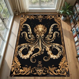 May include: A rectangular black rug with a detailed golden octopus design. The octopus has intricate patterns and is framed by a golden ornate border. The rug is on a wooden floor, creating a striking contrast.